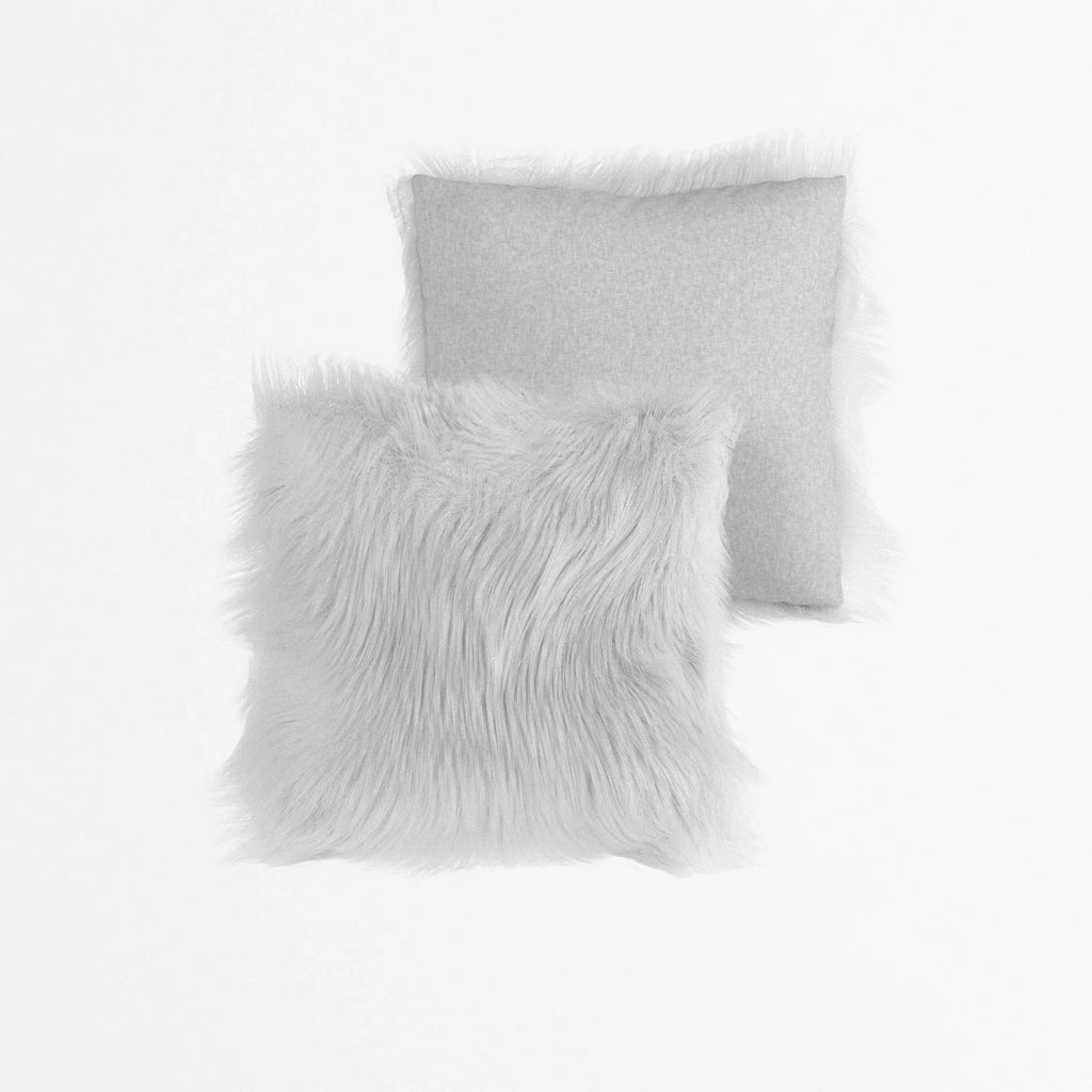 Coussin effet fourrure blanche déhoussable 40x40cm