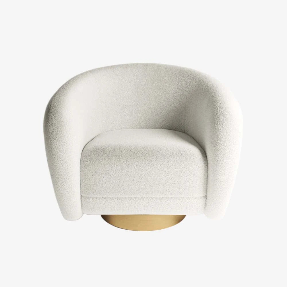 Fauteuil effet laine bouclée et laiton