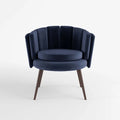 Fauteuil en velours bleu nuit