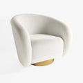 Fauteuil effet laine bouclée et laiton