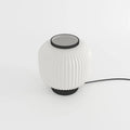 Lampe à poser en verre opaque blanc et métal noir