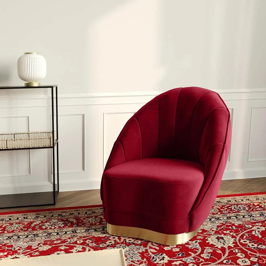 Fauteuil en velours bordeaux, base cerclage dor  effet laiton